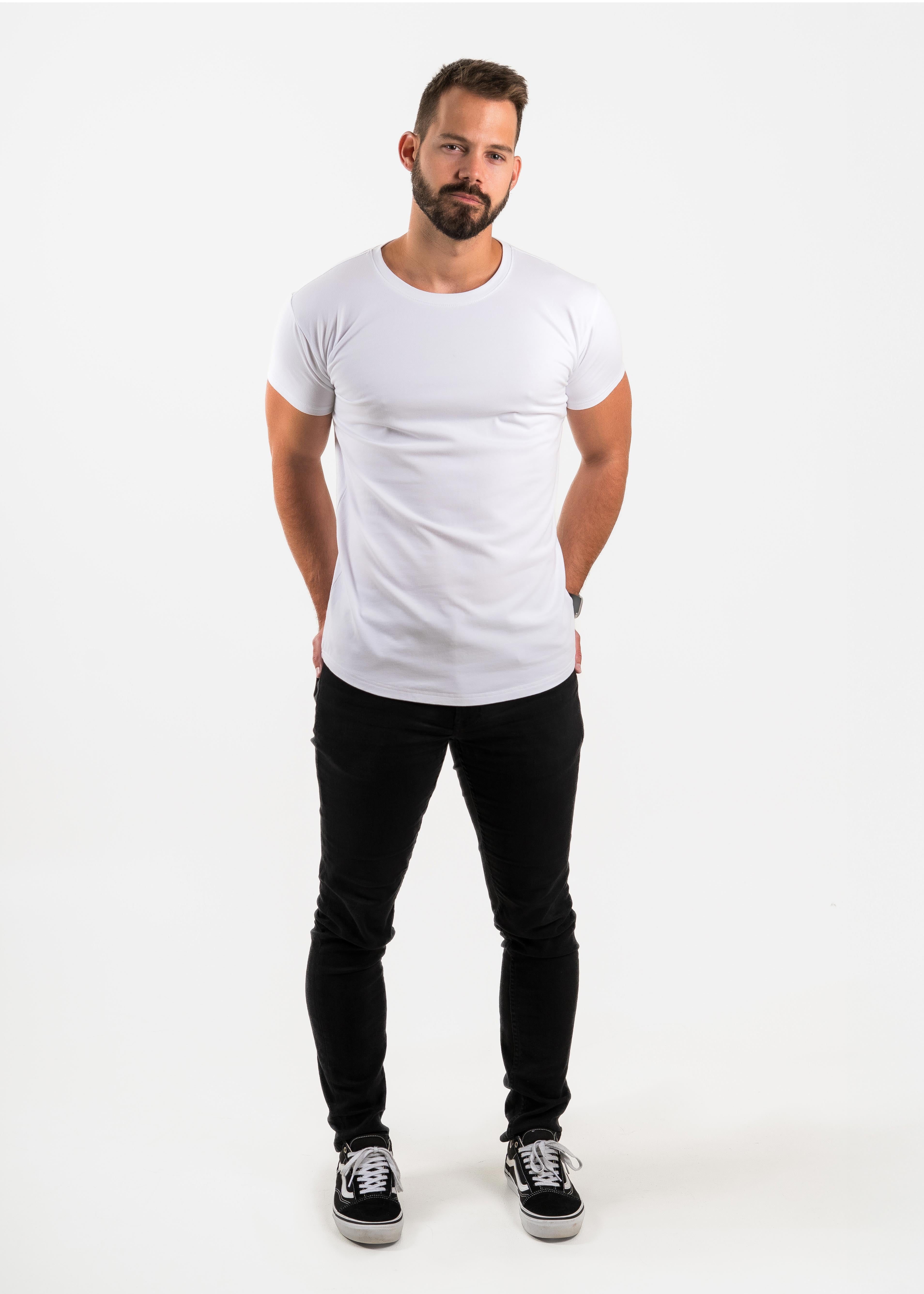 Man wearing a white t-shirt and black pants on a white background