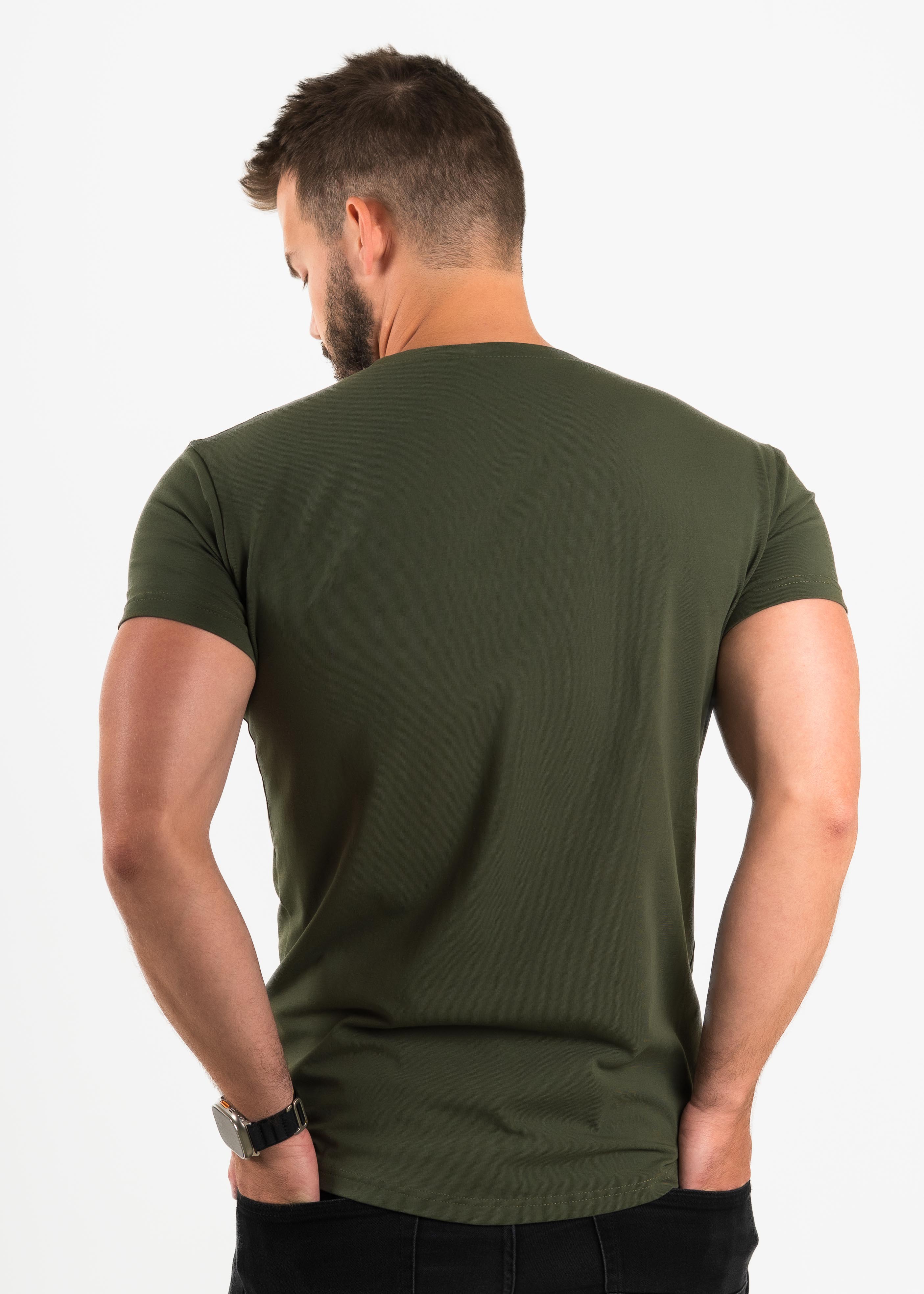 Man wearing a green t-shirt on a white background